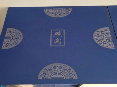 Laser engraving patterns and characters on cardboard
